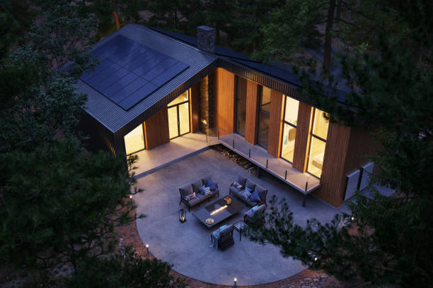 forest house with solar panels and wall battery for energy storage 1